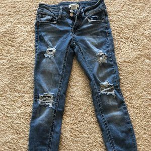 Ripped blue jeans